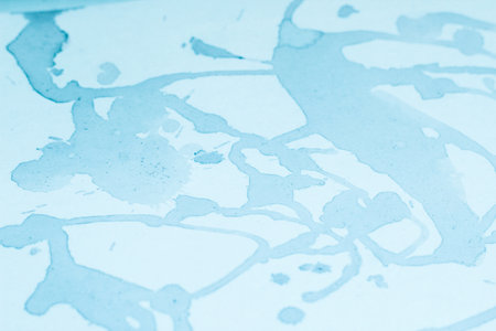 Watercolor blue splashes divorce background.の写真素材