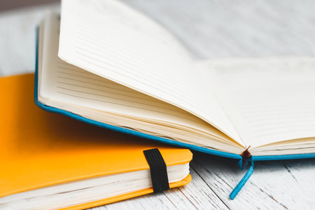 Notebook diary for planning in blue and yellow.の写真素材