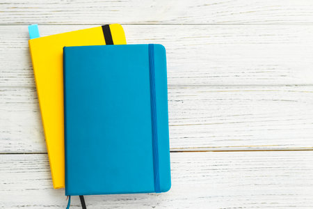 Notebook diary for planning in blue and yellow.の写真素材