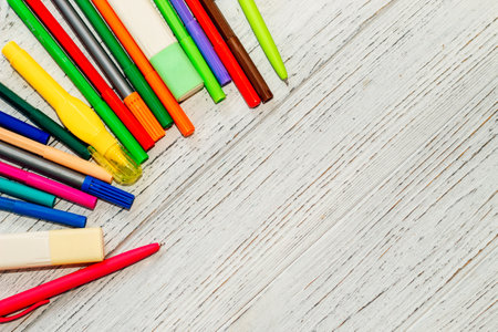 Stationery, colored felt-tip pens on a white table.の写真素材