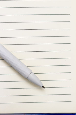 The pen lies in the notebook, the concept of study, time management.の写真素材