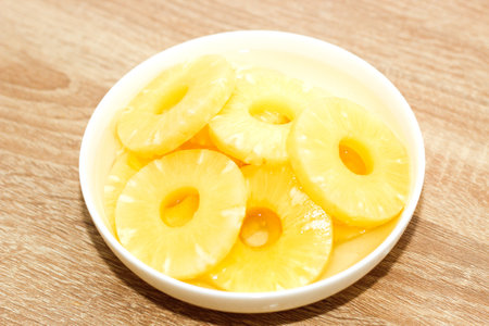 Pineapple rings canned in syrup close-up.の写真素材