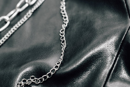 Chain on black texture eco soft leather, fashionable jacket.の写真素材