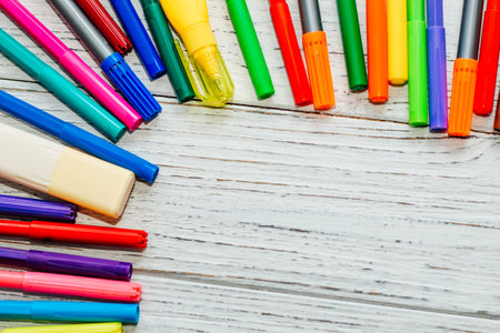 Stationery, colored felt-tip pens on a white table.の写真素材
