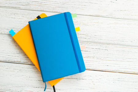 Notebook diary for planning in blue and yellow.の写真素材