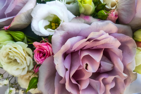 Bouquet of flowers with roses and eustomaの写真素材
