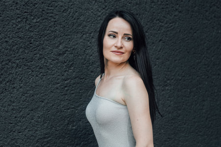 Portrait of a beautiful woman with long black hairの写真素材