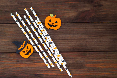 Cocktail sticks on a wooden table, Halloween conceptの写真素材