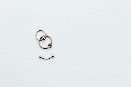 Earrings and rings made of medical steel for piercingの写真素材