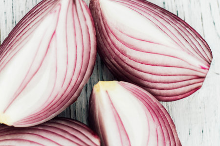 Chopped green onions on a white tableの写真素材