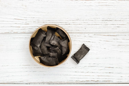 nicotine pouches tobacco, black snus on the backgroundの写真素材