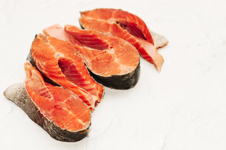 Cut red river trout fish steaks, homemadeの写真素材