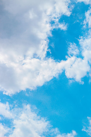 Texture of blue sky with clouds, background