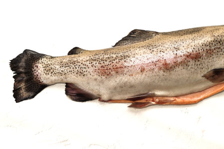 Fish red river trout, cleaning the scales, home cooking