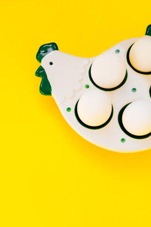 Stand for eggs in the rustic style in the shape of a chickenの写真素材
