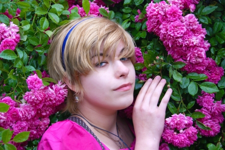 girl and pink bushの写真素材