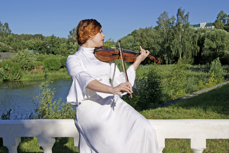 Girl with a violinの写真素材