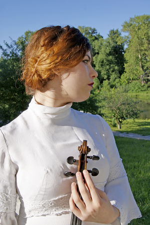 Girl with a violinの写真素材