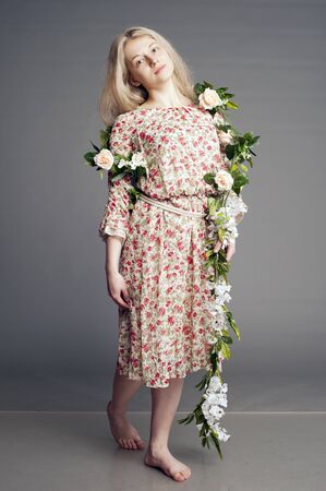 summer dress, dress in a floret, blonde, girl with long hair, blondinska with long hair, girl with blue eyes, beautiful blonde,の写真素材