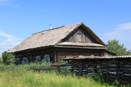 The old rural wooden house in the summer in Siberia  Russiaの写真素材