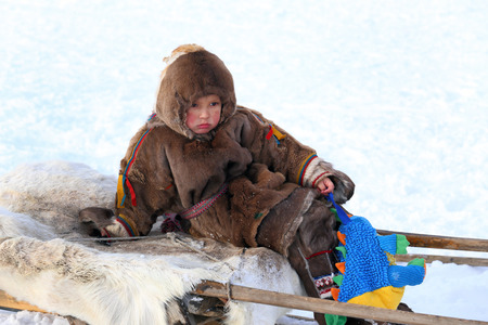 NADYM, RUSSIA - MARCH 14, 2015: The boy the Nenets on a traditional holiday "Day of the reindeer breeder". Nenets - the indigenous small people of the Russian Northのeditorial素材