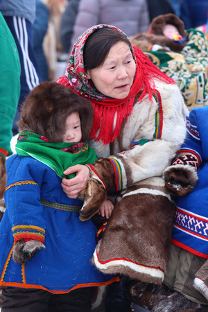 NADYM, RUSSIA - MARCH 04, 2017: Woman Nenets reindeer herder in national dress on a traditional holiday "Day of the reindeer breeder". Nenets - aboriginals of the Russian Northのeditorial素材