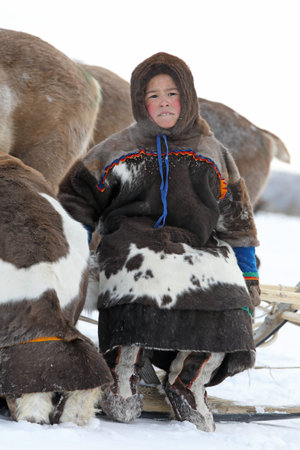 NADYM, RUSSIA  MARCH 04, 2018: Nenets Boy during the traditional holiday of the reindeer breeder Day. Nenets  aboriginals of the Russian Northのeditorial素材