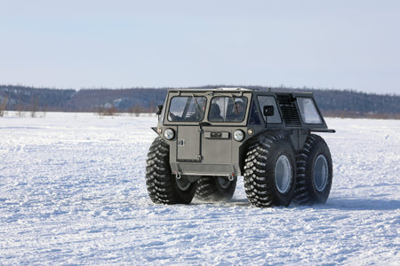 Nadym, RUSSIA-MARCH 13, 2022: Russian snowmobile Phoenix rides on the Arctic tundraのeditorial素材