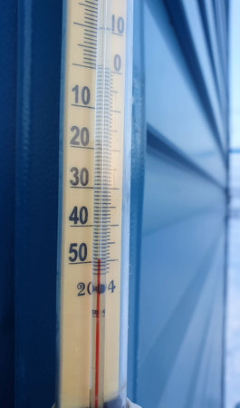 Very low temperature on an alcohol thermometer on a winter day in northern Siberia