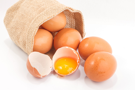 Eggs in a small sack isolated on white backgroundの写真素材