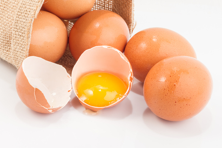 Eggs in a small sack isolated on white backgroundの写真素材