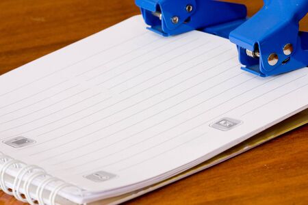 Notebook and perforatorの写真素材