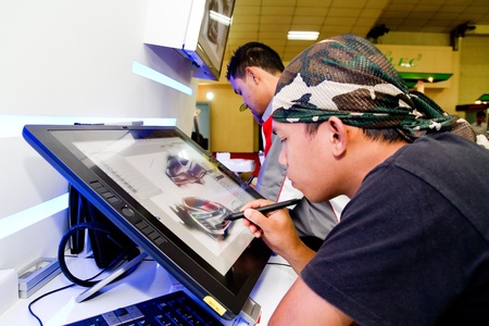 KUALA LUMPUR, MALAYSIA - DEC 3: An unidentified artist showcasing a digital sketching of a concept car during Kuala Lumpur International Motor Show (KLIMS2010) on December 8, 2010 in Kuala Lumpur Malaysia.  のeditorial素材