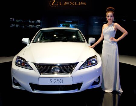 KUALA LUMPUR - DEC 03: An Asian Model pose with Lexus IS250, at the Kuala Lumpur International Motor Show 2010  on DECEMBER 3, 2010 in Kuala Lumpur, Malaysia のeditorial素材