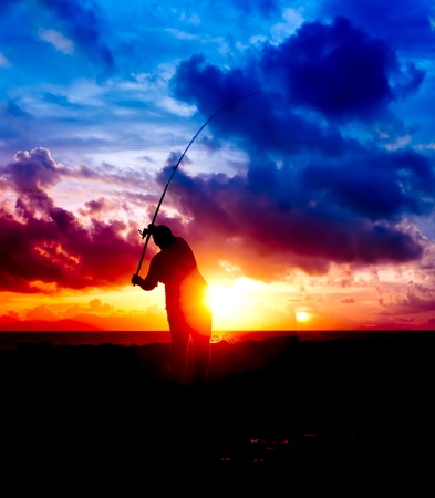 silhouette man fishingの写真素材