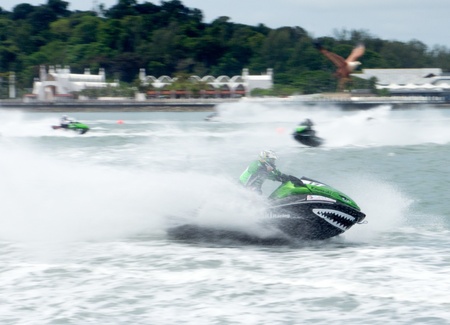 LANGKAWI, MALAYSIA - APRIL 13 : LT Kawasaki Racing Team driver Peter Hor pumps up his machine during Langkawi International Formula Jet Ski Super Series, April 13, 2012 in Langkawi, Malaysia.のeditorial素材