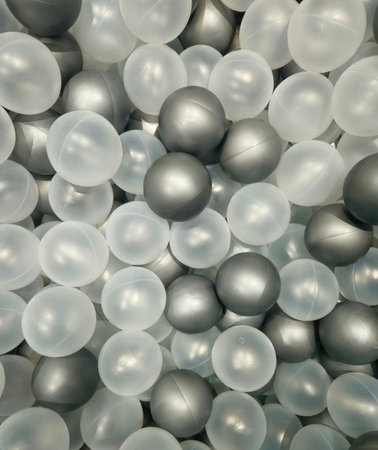 Background of many white plastic balls. Abstract background and texture for design.の写真素材