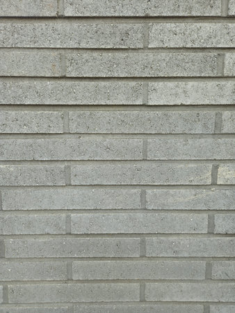 Gray brick wall texture or background for interior exterior decoration and industrial construction concept design.の写真素材