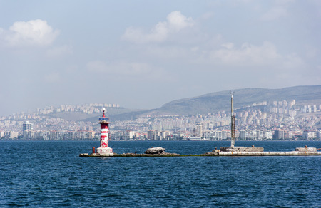 The red lighthouse which located in Izmir bayの写真素材
