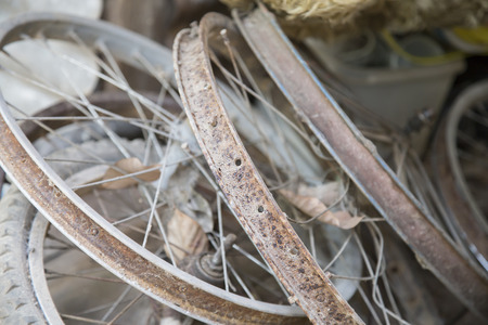 Many old rusty bicycle wheelの写真素材