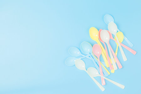 Many plastic spoon colorful pastel style copyspace flatlay empty space for textの写真素材