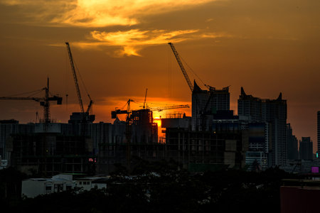 Sunset behind the building,construction Location Bangkok Thailand