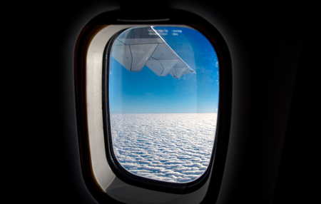 Cloud view through airplane window.の写真素材