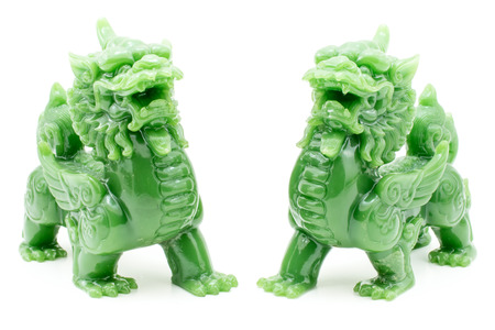 The lion statue the symbol of powerful in Chinese belief isolated backgroundの写真素材