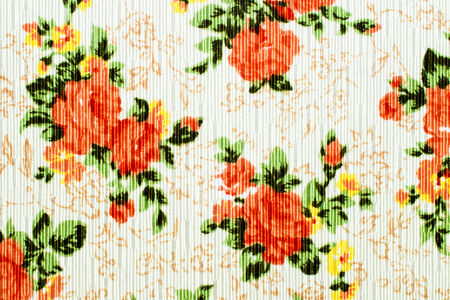 texture, print and wale of fabric orange flowers in beautiful floral patternの写真素材