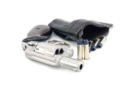 Revolver gun and bullets の写真素材