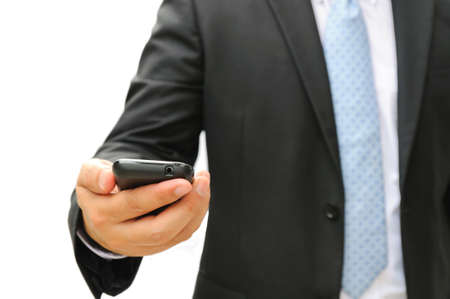 Business man holding a smart phone on white backgroundの写真素材