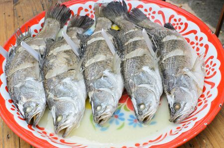 Steamed fish on plate,thai foodの写真素材