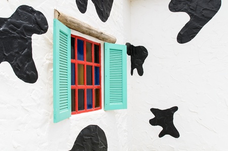 Colourful window beautiful in white wall backgroundの写真素材