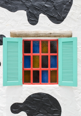 Colourful window beautiful in white wall backgroundの写真素材
